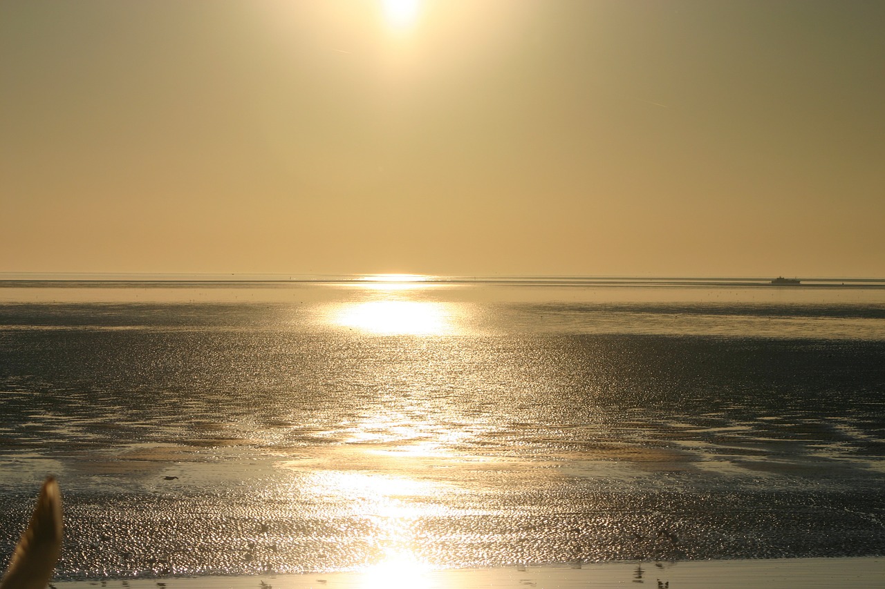 Vakantie Ameland strand zee zonsondergang